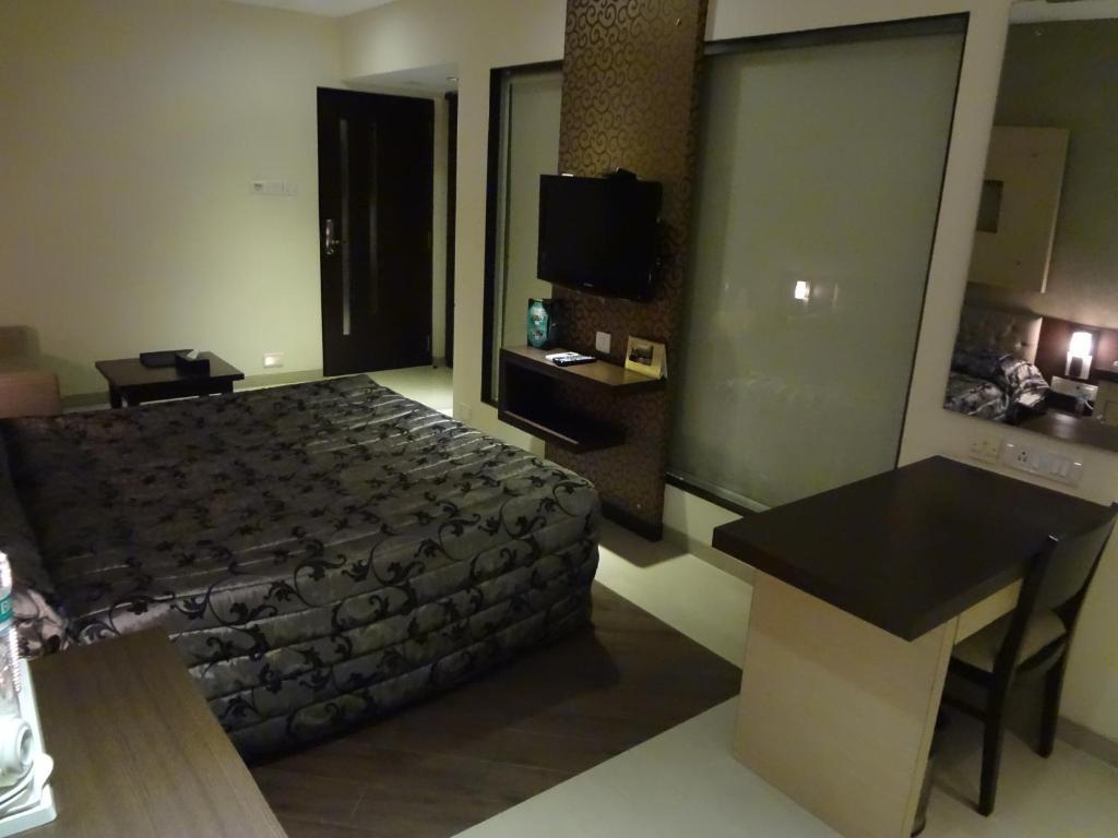 Hotel Capitol Thane Zimmer foto