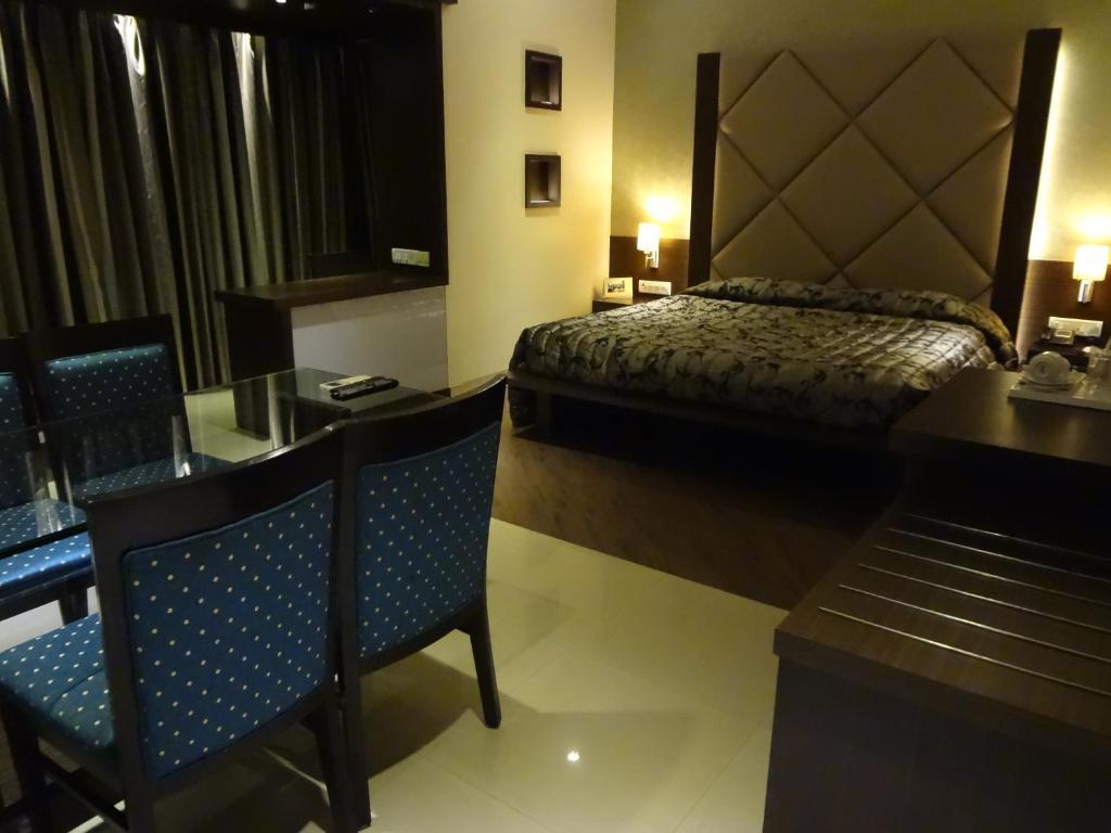 Hotel Capitol Thane Zimmer foto